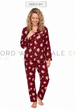 IN48986  female model wearing Indigo Sky ladies Highland cow 100% cotton wincyette pyjamas in burgundy front view