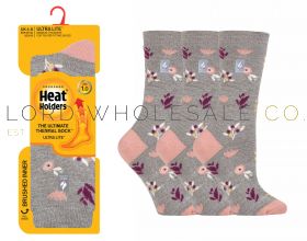 Ladies brushed thermal socks in assorted colours designed for extra warmth, available in wholesale packs.