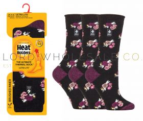 Ladies brushed thermal socks in assorted colours designed for extra warmth, available in wholesale packs.