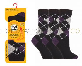 Ladies brushed thermal socks in assorted colours designed for extra warmth, available in wholesale packs.